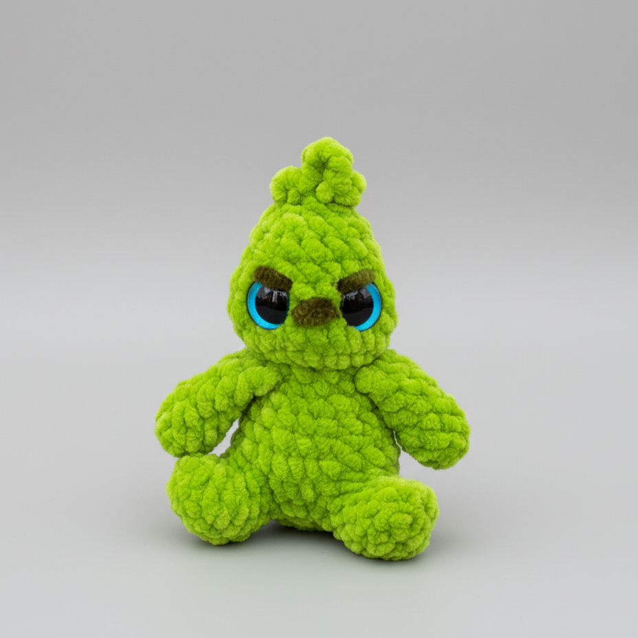Handmade crocheted sitting Grinch plushie made with plush blanket yarn, soft stuffed toy approximately 8 inches tall
