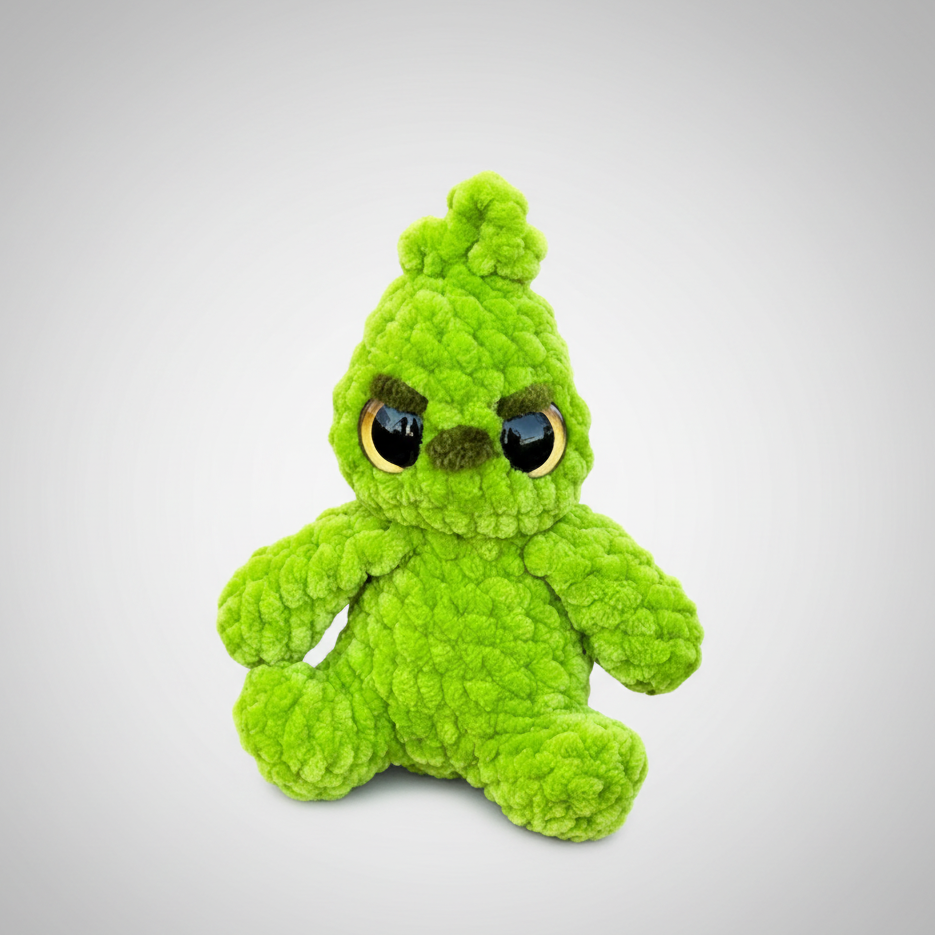 Handmade crocheted sitting Grinch plushie made with plush blanket yarn, soft grinch stuffed toy approximately 8 inches tall”